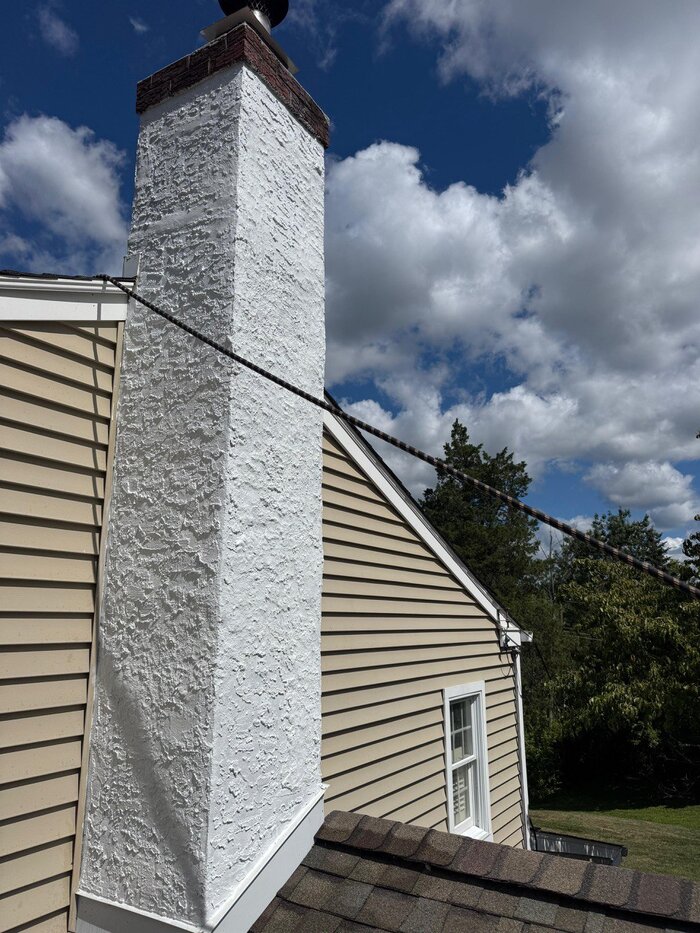 Brick chimney with crown and flashing detail